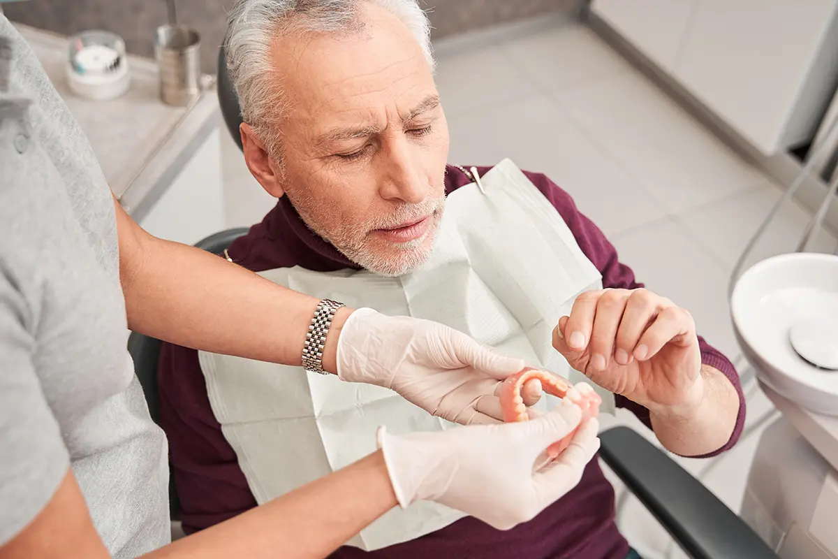 The Difference Between Hybrid Dentures and Traditional Dentures